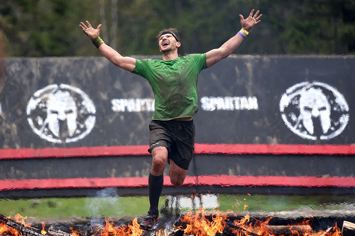 Competitors cross the finish line after completing the 13-mile &#147;Beast&#148; course at Spartan&#146;s Mountain Series Race in Bigfork on Saturday. (Casey Kreider/Daily Inter Lake)