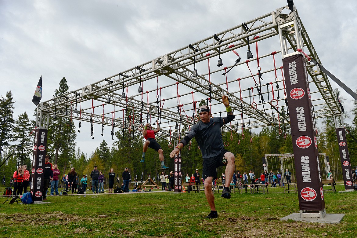 Competitors navigate the 13-mile &#147;Beast&#148; course at Spartan&#146;s Mountain Series Race in Bigfork on Saturday. (Casey Kreider photos/Daily Inter Lake)