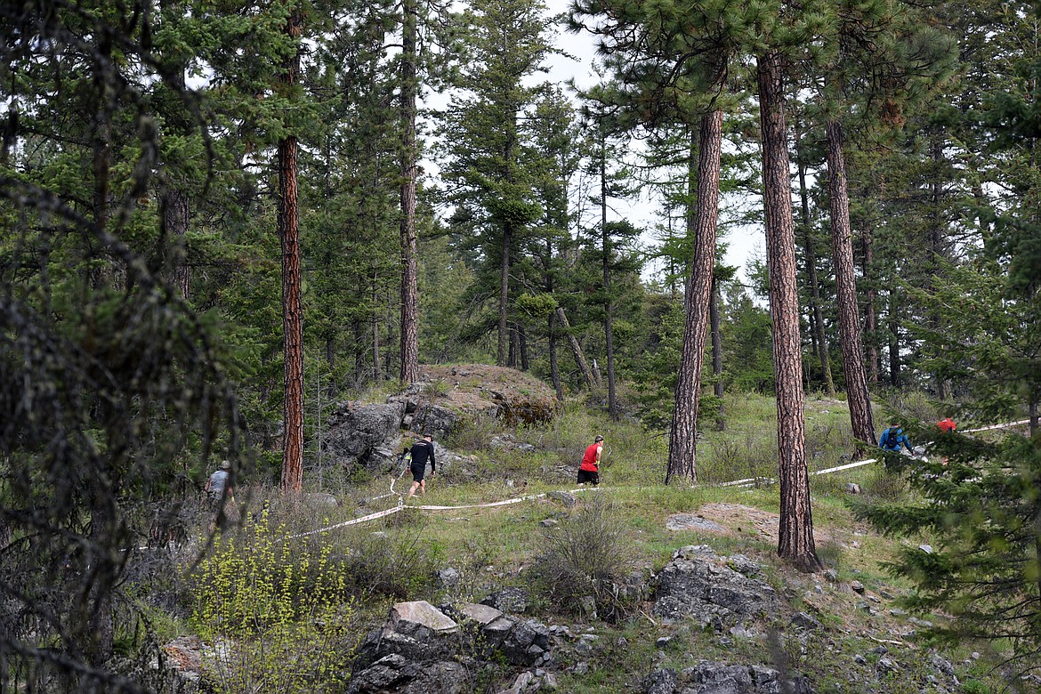 Competitors navigate the 13-mile &#147;Beast&#148; course at Spartan&#146;s Mountain Series Race in Bigfork on Saturday. (Casey Kreider/Daily Inter Lake)