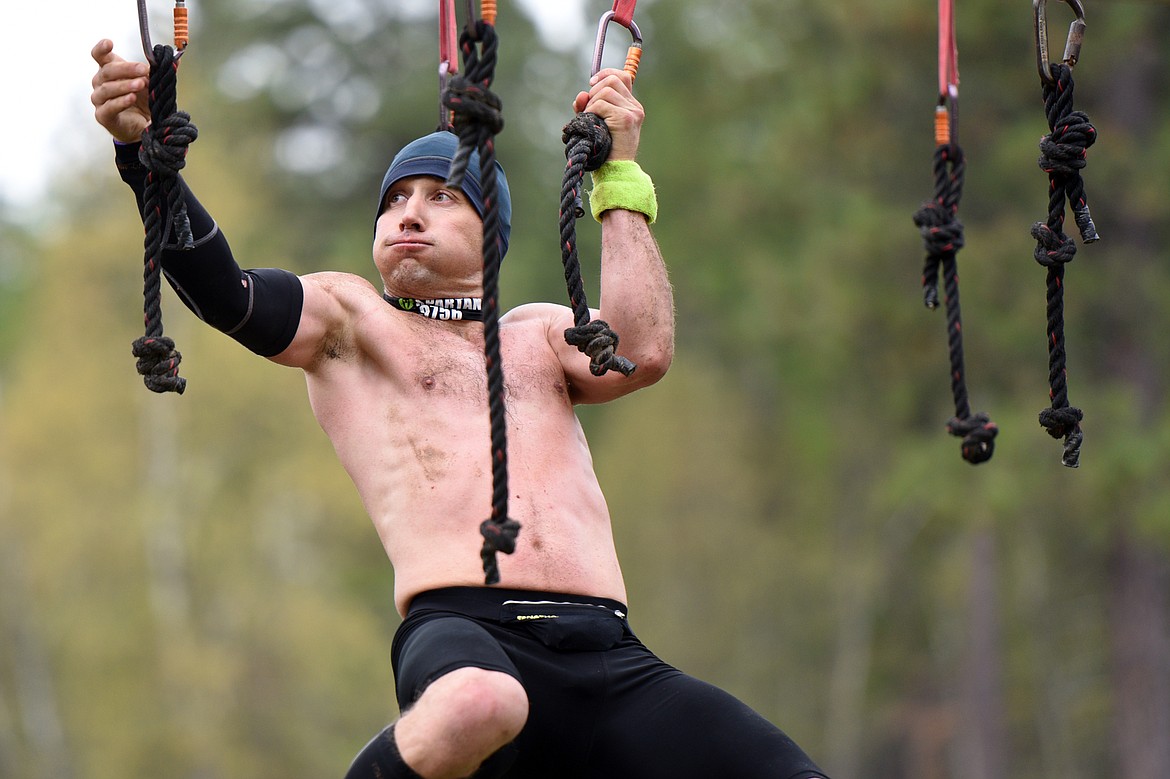 Competitors navigate the 13-mile &#147;Beast&#148; course at Spartan&#146;s Mountain Series Race in Bigfork on Saturday. (Casey Kreider/Daily Inter Lake)