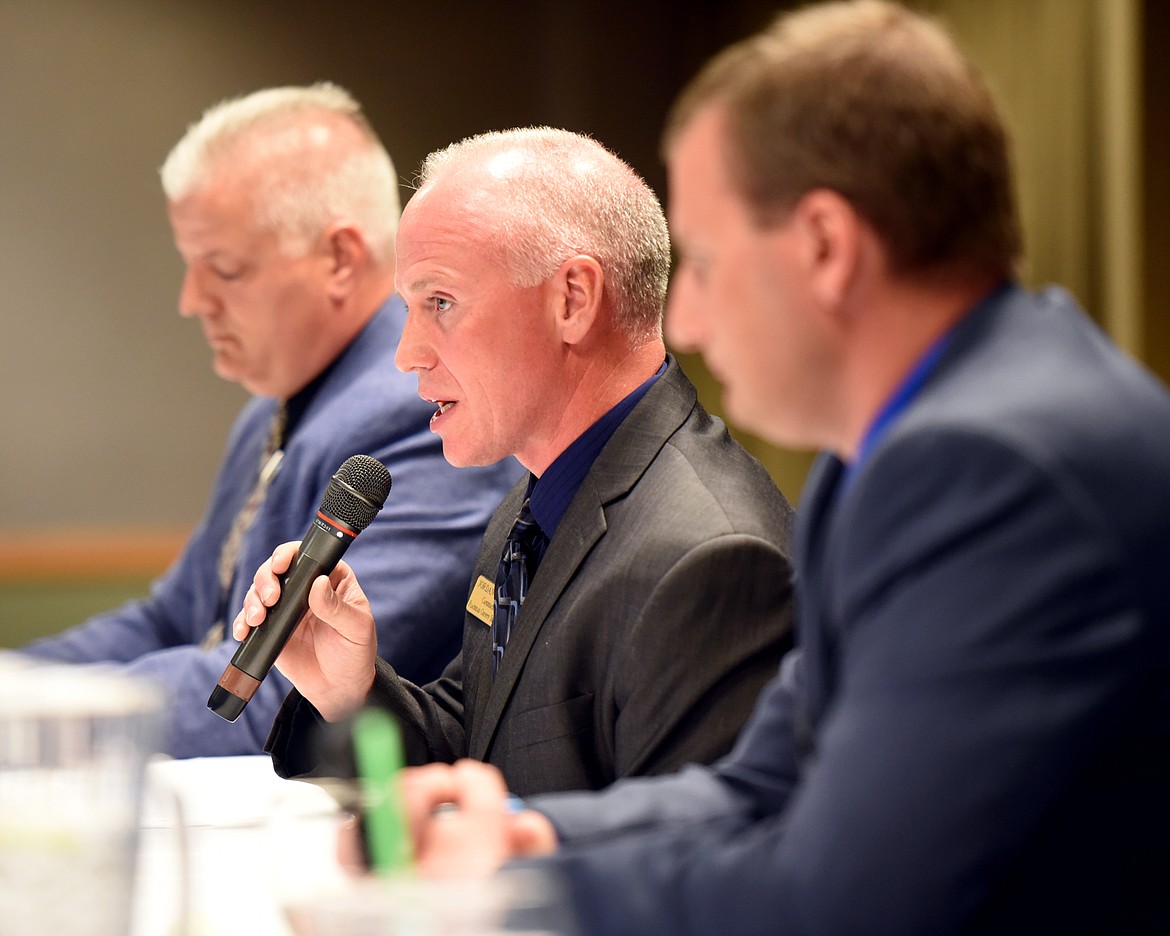 Former Under Sheriff Jordan White speaking at the&#160;candidates debate on Thursday evening, April 26, at the Red Lion Hotel in Kalispell. White&#160;left the Flathead County Sheriff&#146;s Office in 2012 to cofound Two Bear Air. The primary vote, which will determine the next sheriff, is scheduled for June 5.
(Brenda Ahearn/Daily Inter Lake)&#160;