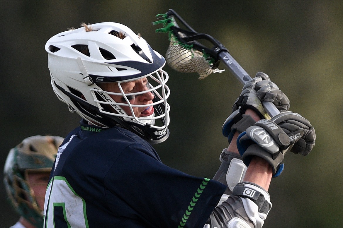 Glacier&#146;s Logan Hill (19) fires a shot on goal against Whitefish on Thursday. (Casey Kreider/Daily Inter Lake)