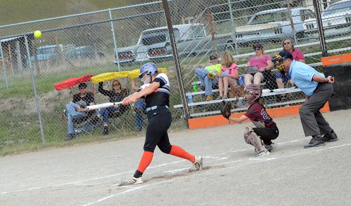 Trotter Jessica Thompson hits a single that also resulted in two runners making it across home plate from the play (Erin Jusseaume/ Clark Fork Valley Press)