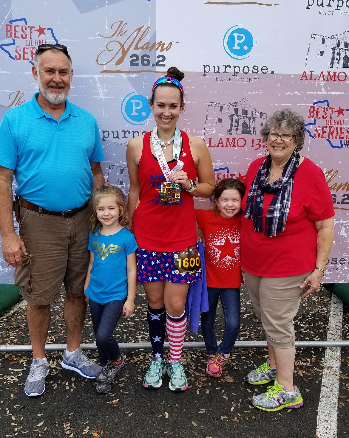 Whitney pictured with family after her marathon run in Texas earlier this year. (Photo supplied by family)