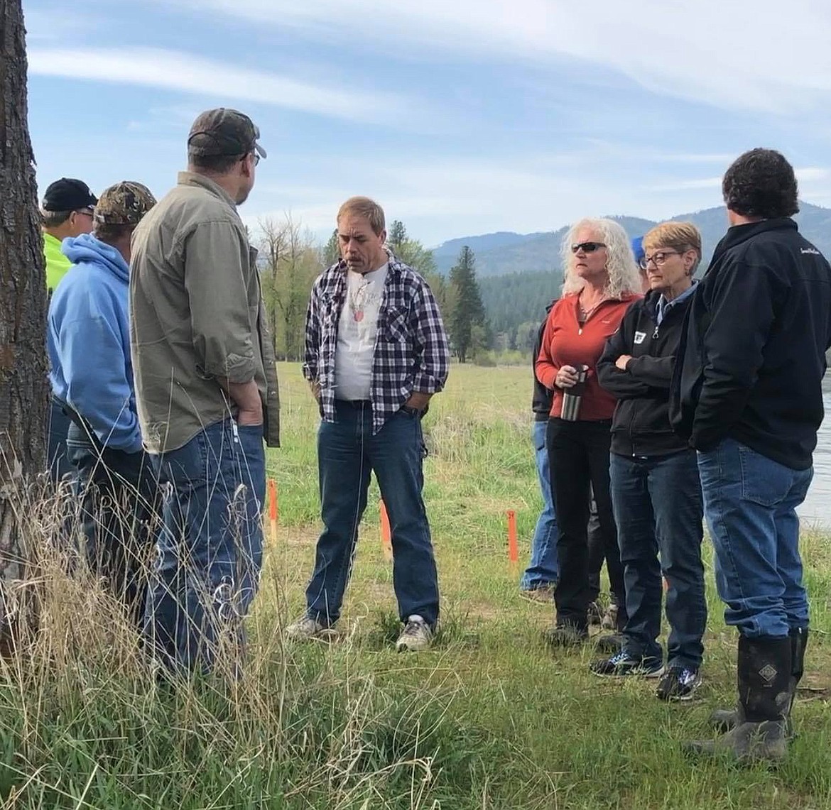 Plains Mayor Danny Rowan, Sanders County Commissioner Carol Brooker and Sanders County Emergency Manager Bill Naegeli meet with other officials to discuss the impending emergency along the banks of the Clark Fork River in Plains last week. (Erin Jusseaume/Clark Fork Valley Press)