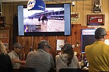 Supporters gather to cheer on Derby runner Bolt d'Oro
