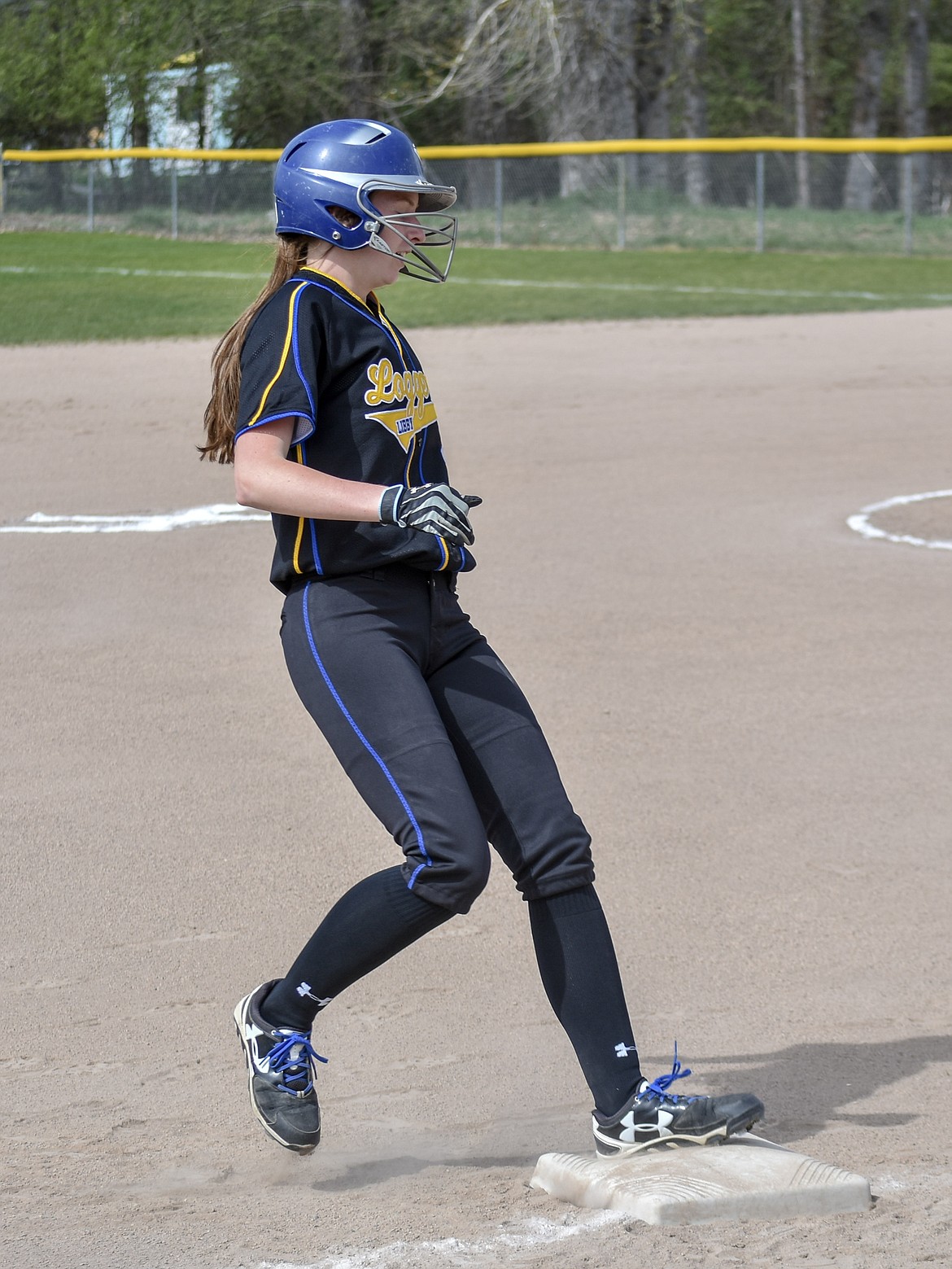 Libby junior Samantha Miller hit a triple that batted in two runners during the first inning of Libby&#146;s 17-0 win against Browning Saturday.