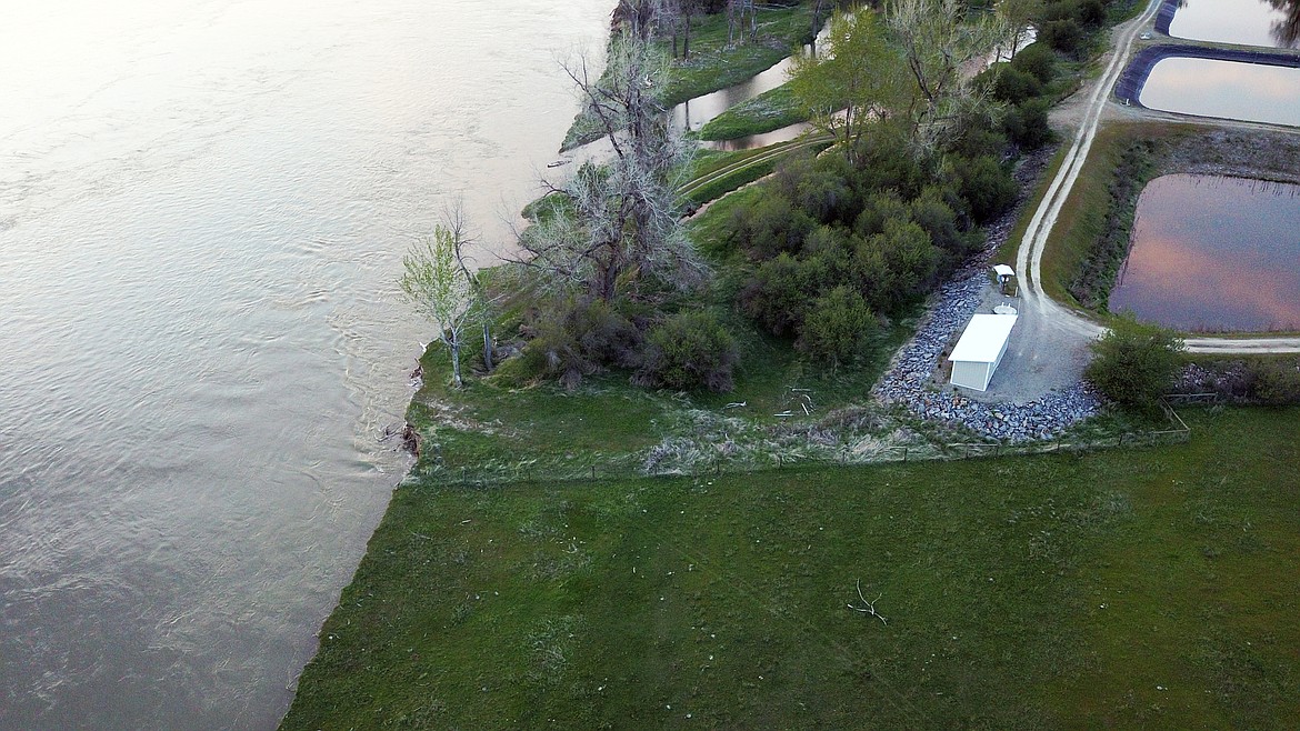 An areial view providing a look at the dangers of how close the Clark Fork River is to creating a possbile enviornmental danger at the waste water treatment lagoons in Plains (photo supplied by the Plains-Paradise Rural Fire Department)