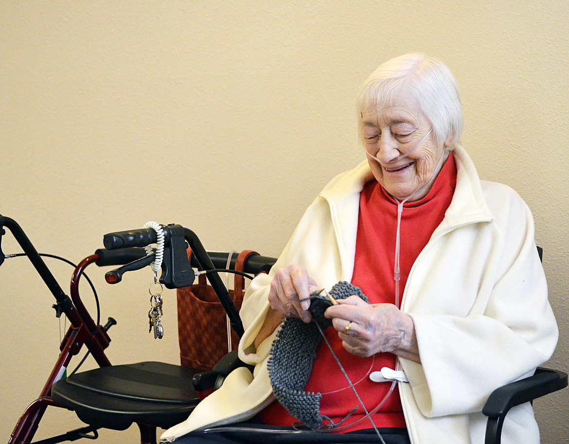 Vivian Harrison knits a hat Wednesday afternoon during a gathering of the Knit Wits group at The Springs at Whitefish. (Heidi Desch/Whitefish Pilot)