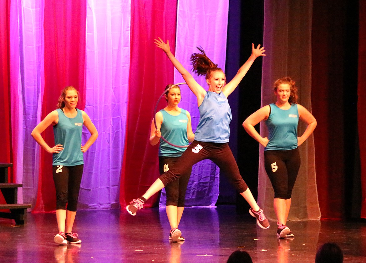 Photo by MANDI BATEMAN
Lindsey Christopherson leaping high during the fitness portion of the competition.