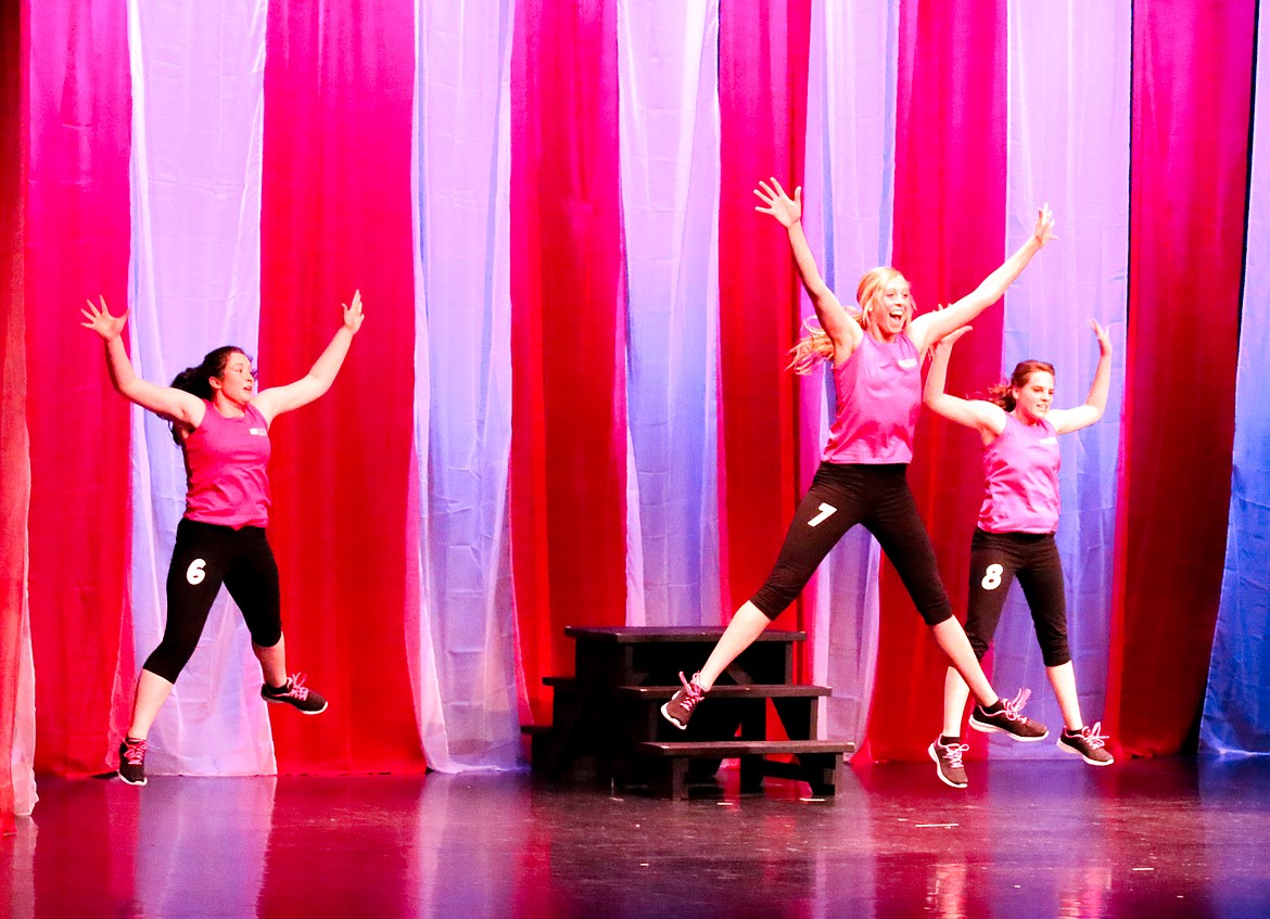 Photo by MANDI BATEMAN
From left to right: Hannah Beaze, Jerzie Pluid, and Stormy Fahey, during the fitness competition.