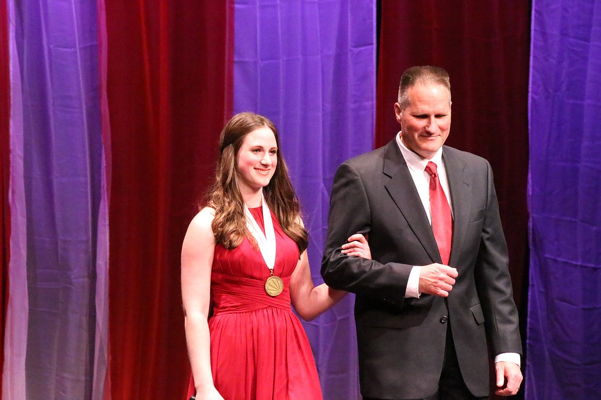 Photo by MANDI BATEMAN
Last years DYW Hannah Sims is escorted by her father David Sims.