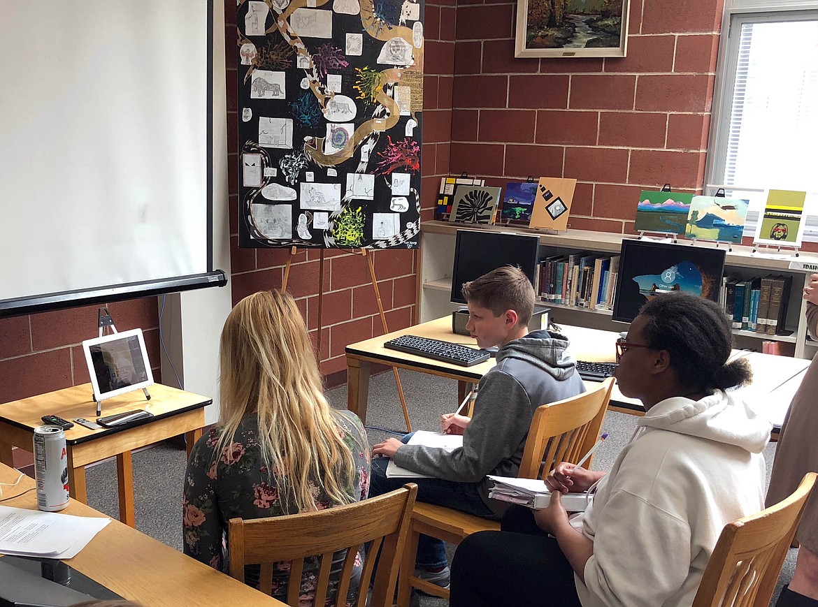 Photo by JOSH MCDONALD
Students enjoy a Skype interview in the library with Bruce Flohr as part of the Wallace Fall for History essay contest.