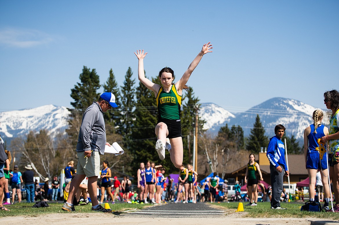 Kaiah Moore leaps in the long jump at the A.R.M. Invitational Saturday at Whitefish High School.