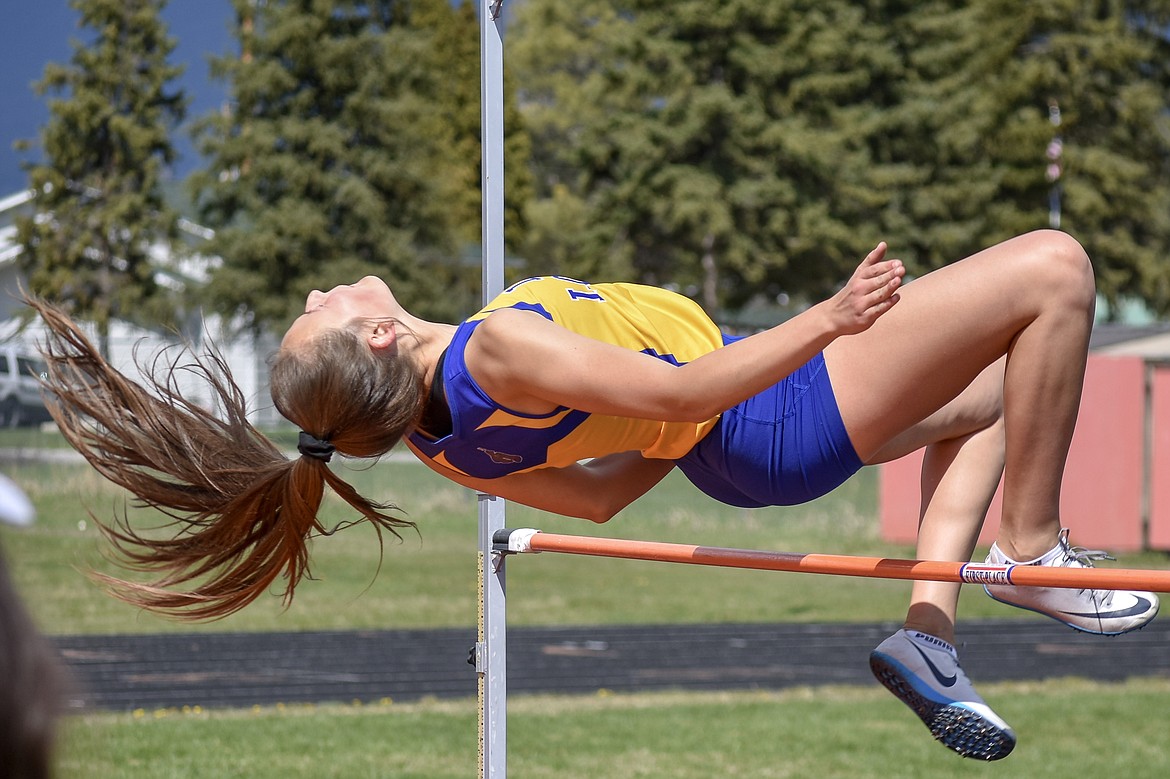 Libby senior Emily Mossburg clears the bar at 4 foot 8 inches at the Lincoln County Track Meet Tuesday.  Mossburg won the event with a 4 foot 10 inch jump.