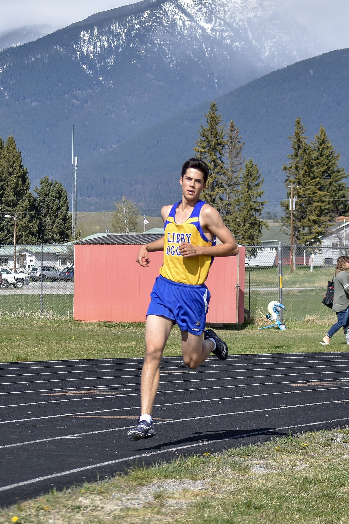 Libby sophomore John Cheroske competes in the 1,600m run at the Lincoln County Track Meet Tuesday. Cheroske ran a personal record time of 5:08.94. (Benjamin Kibbey/The Western News)