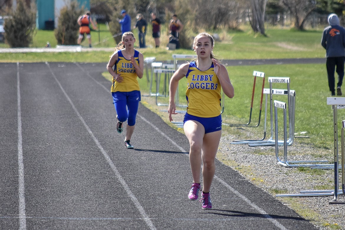 Libby sophomore Kylee Quinn finished the 1,600m run in second place with a season record time of 6:40.12, followed closely by freshman Halona LaFleur with a 6:44.96, at the Lincoln County Track Meet Tuesday. (Benjamin Kibbey/The Western News)