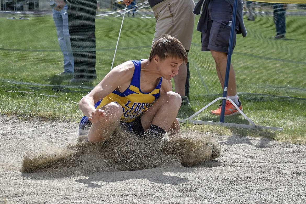 Libby senior Gavin Strom wins the long jump with a personal record 23 feet 10 inch jump at the Lincoln County Track Meet Tuesday. The jump qualified Strom for state. (Benjamin Kibbey/The Western News)