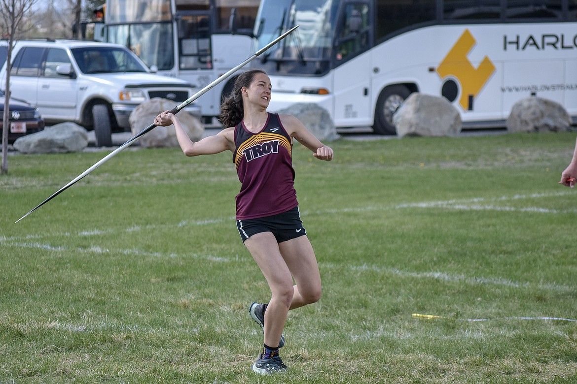 Troy freshman Liz Morkeberg competes in the javelin throw during the Lincoln County Track Meet Tuesday. The only freshman in the event, Morkeberg threw a personal record 50 feet 2 inches. (Benjamin Kibbey/The Western News)