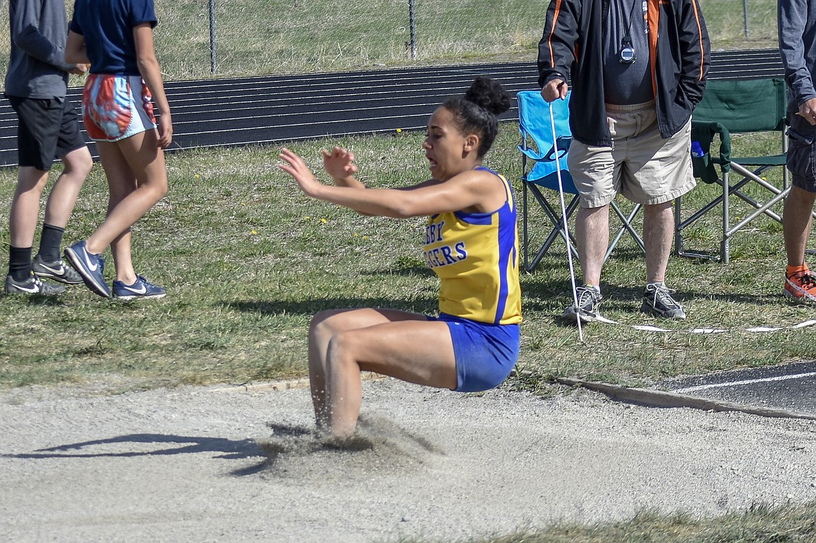 Libby freshman Olivia Gilliam-Smith competes in the long jump at the Lincoln County Track Meet Tuesday. (Benjamin Kibbey/The Western News)