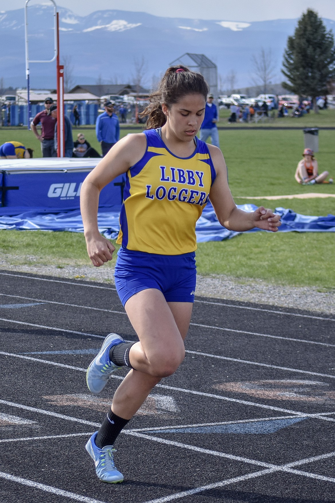 Libby junior Isabella Hollingsworth finishes the 100m hurdles in second place with a season record time of 17.59 seconds at the Lincoln County Track Meet Tuesday. (Benjamin Kibbey/The Western News)