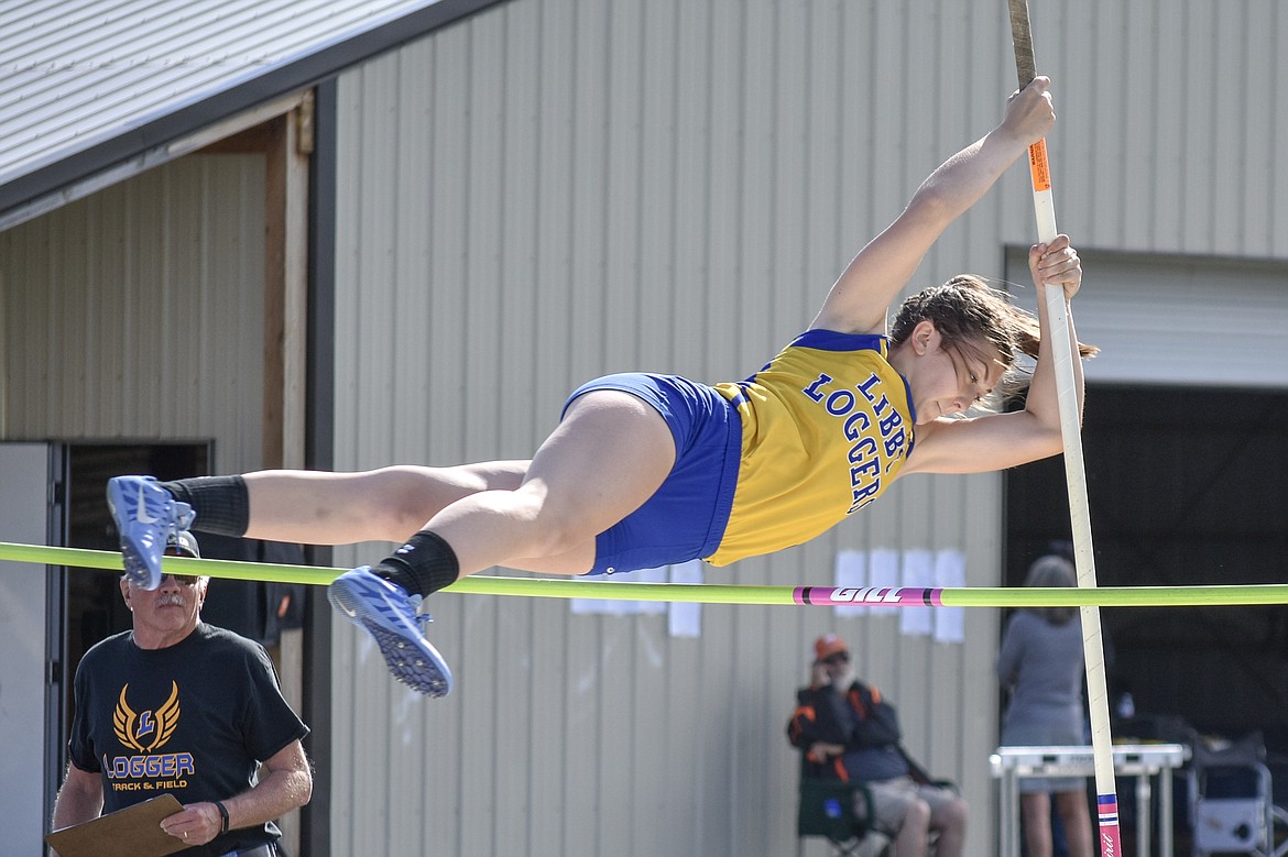 Libby sophomore Jaycee Thornock clears the bar in the pole vault at the Lincoln County Track Meet Tuesday. (Benjamin Kibbey/The Western News)