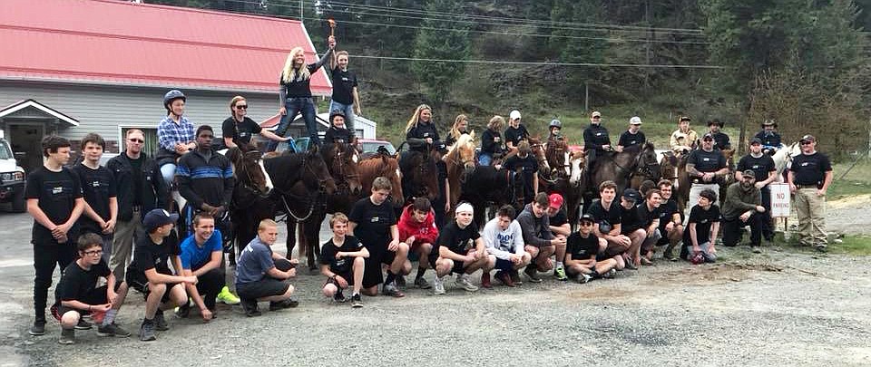 Torch carriers take a quick lunch break in front of the Thomspon Falls Rural Fire Hall (photo supplied)