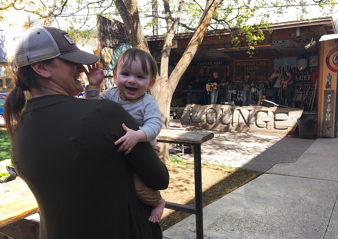 Seven-month-old Soloman Suchy enjoys a dance with mom, Kayla Suchy, at his first Taste of Bigfork.