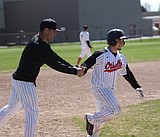 Tigers take bite out of Huskies in doubleheader action