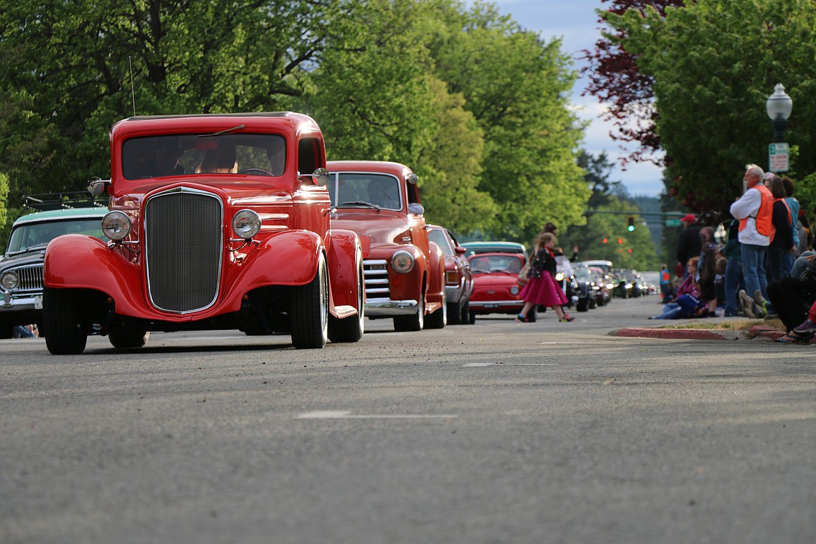 (Photo by CAROLINE LOBSINGER)Classic cars make their way down Church Street.