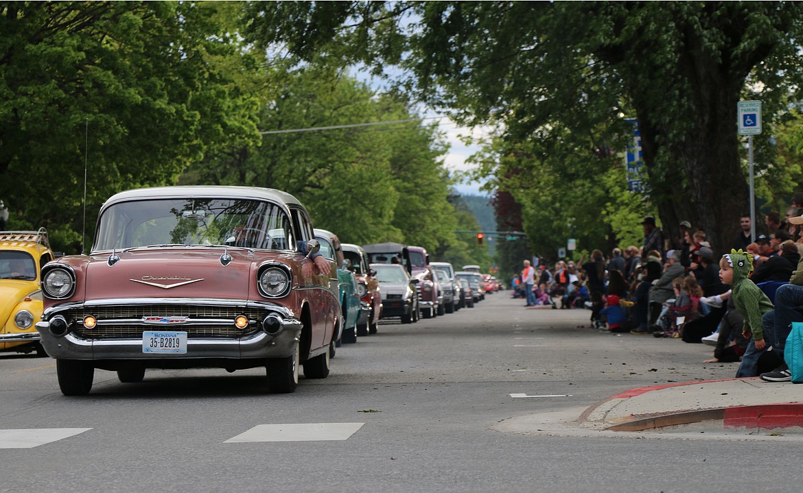 (Photo by CAROLINE LOBSINGER)Classic cars make their way down Church Street.