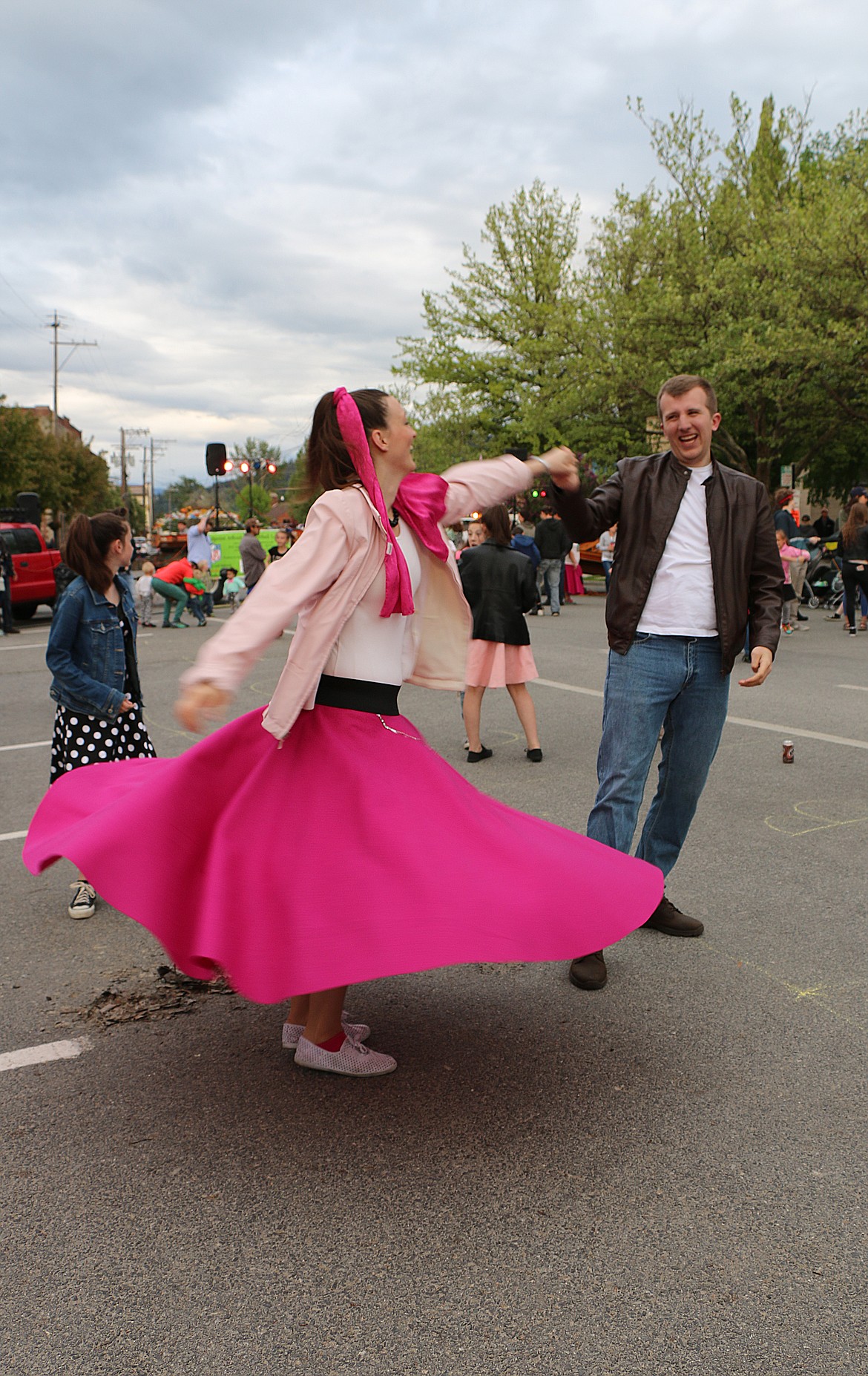 A couple dances at the street dance following a Lost in the '50s car parade.