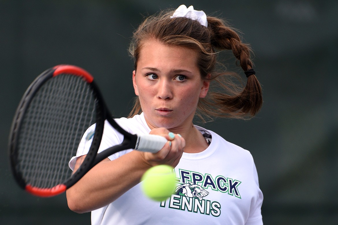 Glacier's Maria Frampton hits a return against Bozeman's Heather Sikoski in the Class AA State Tennis Tournament at Flathead Valley Community College in Kalispell on Friday. (Casey Kreider/Daily Inter Lake)