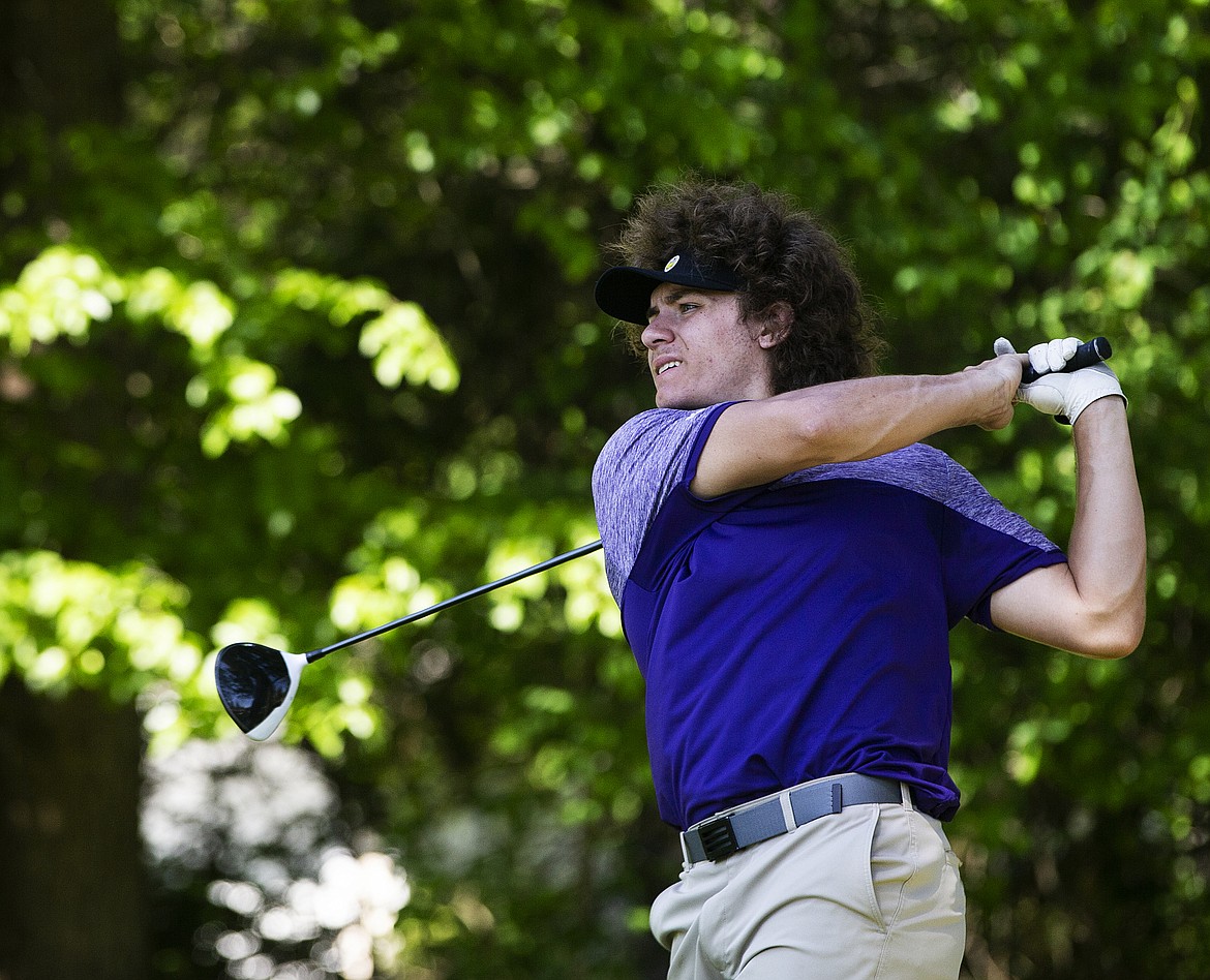 Chase Jerome of Kellogg High watches his drive off the hole thirteen tee Tuesday morning at the state 3A Tournament at Twin Lakes Village. (LOREN BENOIT/Press)