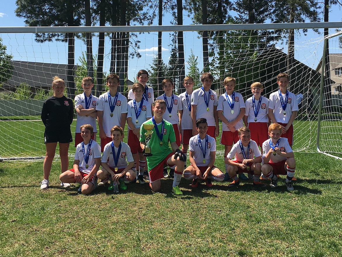 Courtesy photo
The Sting Timbers 05 Boys Red soccer team took first place in the under-13 division at the Bill Eisenwinter Hot Shot Tournament last weekend. The Sting beat the Valley Elite FC 13-0 at the Coeur d&#146;Alene Soccer Complex. Goals were scored by Landon Lee (2), Cooper Prohaska (2), Caden Thompson, Gunner Larson (2), Blaine Leonard, Miles Taylor, Jace Simmet (2) and Chet Hanna (2). The shutout in goal was a combined effort by Miles Taylor, Landon Lee, Caden Thompson and Nate Wyatt. Saturday night, the Sting beat the Flathead Rapids 7-0 at the Coeur d&#146;Alene Soccer Complex. Goals were scored by Isaac Fritts, Drew Hansen (3), Landon Lee and Cooper Prohaska, with assists by Isaac Fritts and Nate Wyatt. Miles Taylor posted the shutout in goal. In the semifinals, the Sting beat the Missoula Strikers Red 6-3 at the Canfield Sports Complex. Sting goals were scored by Caden Thompson, Landon Lee, Cooper Prohaska (2) and Isaac Fritts (2), with an assist by Nate Wyatt. In the championship game, the Sting beat the North Idaho Inferno 5-0 at the Coeur d&#146;Alene Soccer Complex. Goals were scored by Cooper Prohaska, Isaac Fritts, Drew Hansen (2) and Gunner Larson, with assists by Miles Taylor and Isaac Fritts. Miles Taylor posted the shutout in goal.
In the front row from left are Chet Hanna, Landon Lee, Miles Taylor, Drew Hansen, Nate Wyatt and Caden Thompson; and back row from left, assistant coach Chloe Teets, Gunner Larson, Cooper Prohaska, Christopher Mongan, Ashton Ukich, Jayce Simmet, Isaac Fritts, Luke Orozco, Logan Haynes, Blaine Leonard and Jacob Ukich. Not pictured is head coach Mike Thompson.
