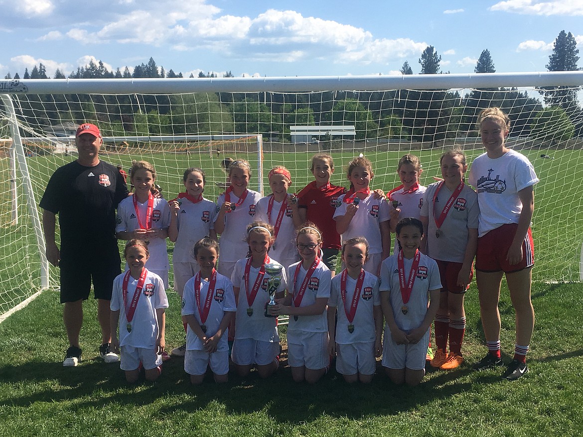 Courtesy photo
The Sting Timbers 07 Girls soccer team took second place in the Bill Eisenwinter Hot Shot Tournament this past weekend. They defeated Idaho Rush in the morning to earn their spot in the afternoon championship game, where they lost 2-1 to the Missoula Strikers. The Sting goal was scored by Natalie Thompson in a penalty kick. In the front row from left are Avery Hickok, Kate Mauch, Natalie Thompson, Paige Hunt, Olivia May and Annabelle Rogers; and back row from left, 
coach Mike Thompson, Sofia Peressini, Zayda Voigt, Rachel Corette, Emma Decker, Lydia Lehosit, Evelyn Bowie, Libby Morrisroe, Emma Singleton and assistant coach Izzy Lehosit.