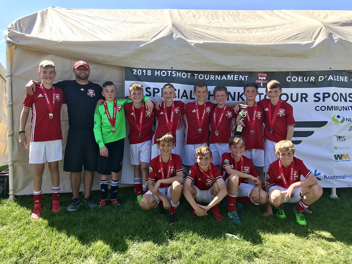 Courtesy photo
The Sting Timbers FC Boys 06 Red played in the Bill Eisenwinter Hot Shot Tournament this past weekend. On Saturday morning, the Sting Timbers beat Helena Arsenal SC &#145;06 Blue 3-0. Max Entzi led Sting with 3 goals. Haidyn Jonas and Max Cervi-Skinner each had an assist. Braden Latscha was in goal for the shutout. On Saturday afternoon, the Sting Timbers beat FC Nova 06 (Boise) 5-0. Haidyn Jonas led Sting with 3 goals, Kason Pintler and Max Cervi-Skinner each had 1 goal. Connor Jump had an assist. Braden Latscha was in goal for the shutout. On Sunday morning, Sting Timbers Red played Sting Timbers B06 White in the semifinals. Red beat White 7-0. Haidyn Jonas and Max Entzi each had 2 goals. Kason Pintler, Connor Jump, and Max Cervi-Skinner each had a goal. Zack Cervi-Skinner had 2 assists. Kason Pintler, Jacob Molina and Max Entzi each had 1 assist. Braden Latscha was in goal for the shutout. On Sunday afternoon, the Sting Timbers FC Boys 06 Red lost 3-2 in the championship final to Flathead Rapids Black. Connor Mongan and Max Entzi each had a goal for the Sting. In the front row from left are Max Cervi-Skinner, Zack Cervi-Skinner, Aiden Rice and Connor Mongan; and back row from left, Max Entzi, coach Matt Ruchti, Braden Latscha, Jacob Molina, Haidyn Jonas, Lachlan May, Connor Jump, Kason Pintler and Ben Hannigan-Luther.