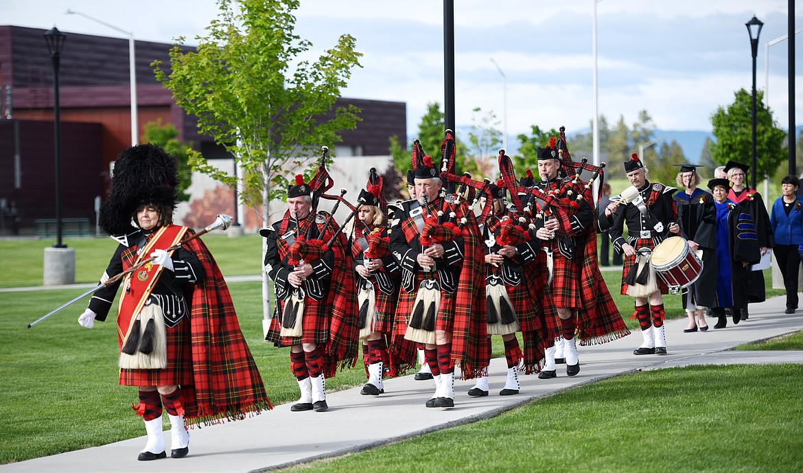 The Montana Highlanders Bagpipe Association leads theprocessional at the start of the Flathead Valley Community College 50th Commencement Ceremony is about to begin on Friday evening, May 18.(Brenda Ahearn/Daily Inter Lake)