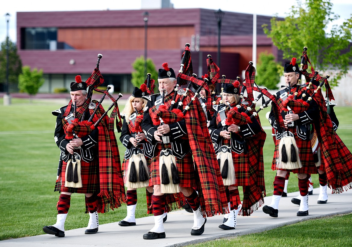 The Montana Highlanders Bagpipe Association leads theprocessional at the start of the Flathead Valley Community College 50th Commencement Ceremony is about to begin on Friday evening, May 18.(Brenda Ahearn/Daily Inter Lake)