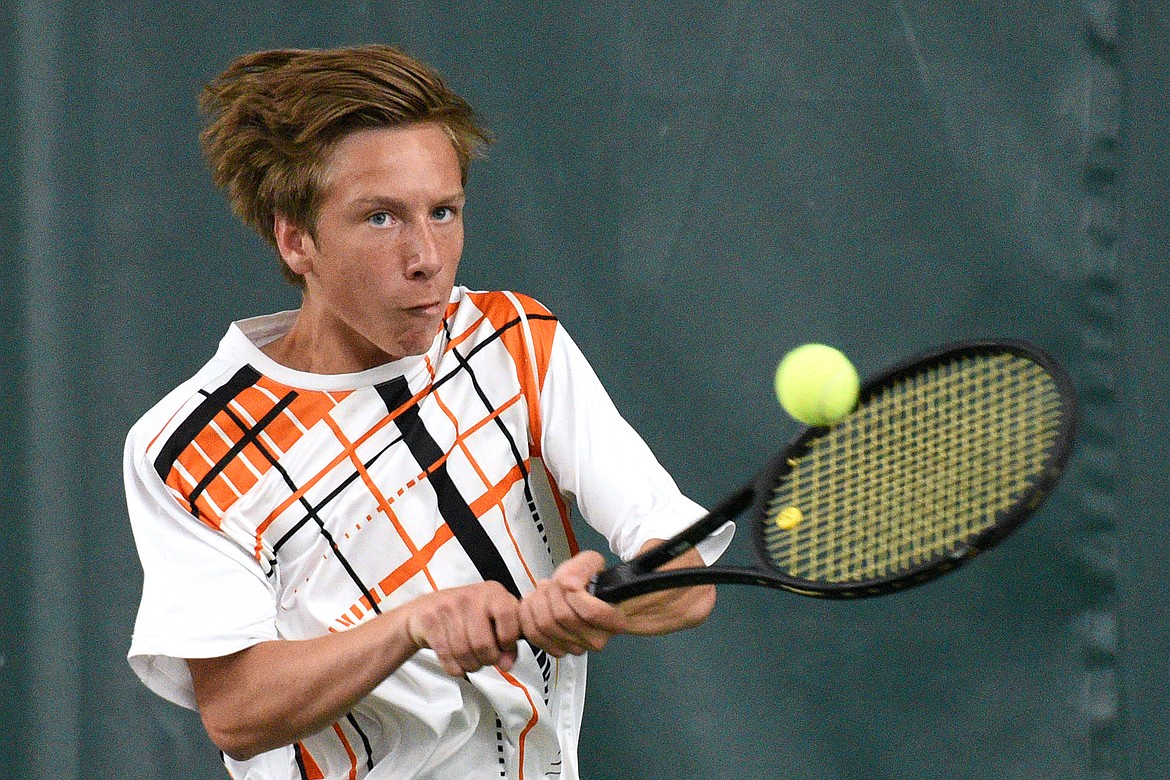 Flathead&#146;s Ethan Hawkins hits a return against Billings Senior&#146;s Jay Montague in the first round of the 2018 AA State Tennis Tournament in Kalispell on Thursday. (Casey Kreider/Daily Inter Lake)