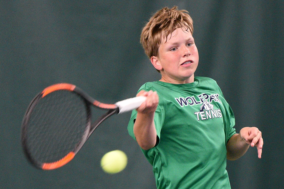 Glacier&#146;s Rory Smith hits a return against Billings Senior&#146;s Andy Bough in the first round of the 2018 AA State Tennis Tournament in Kalispell on Thursday. (Casey Kreider/Daily Inter Lake)