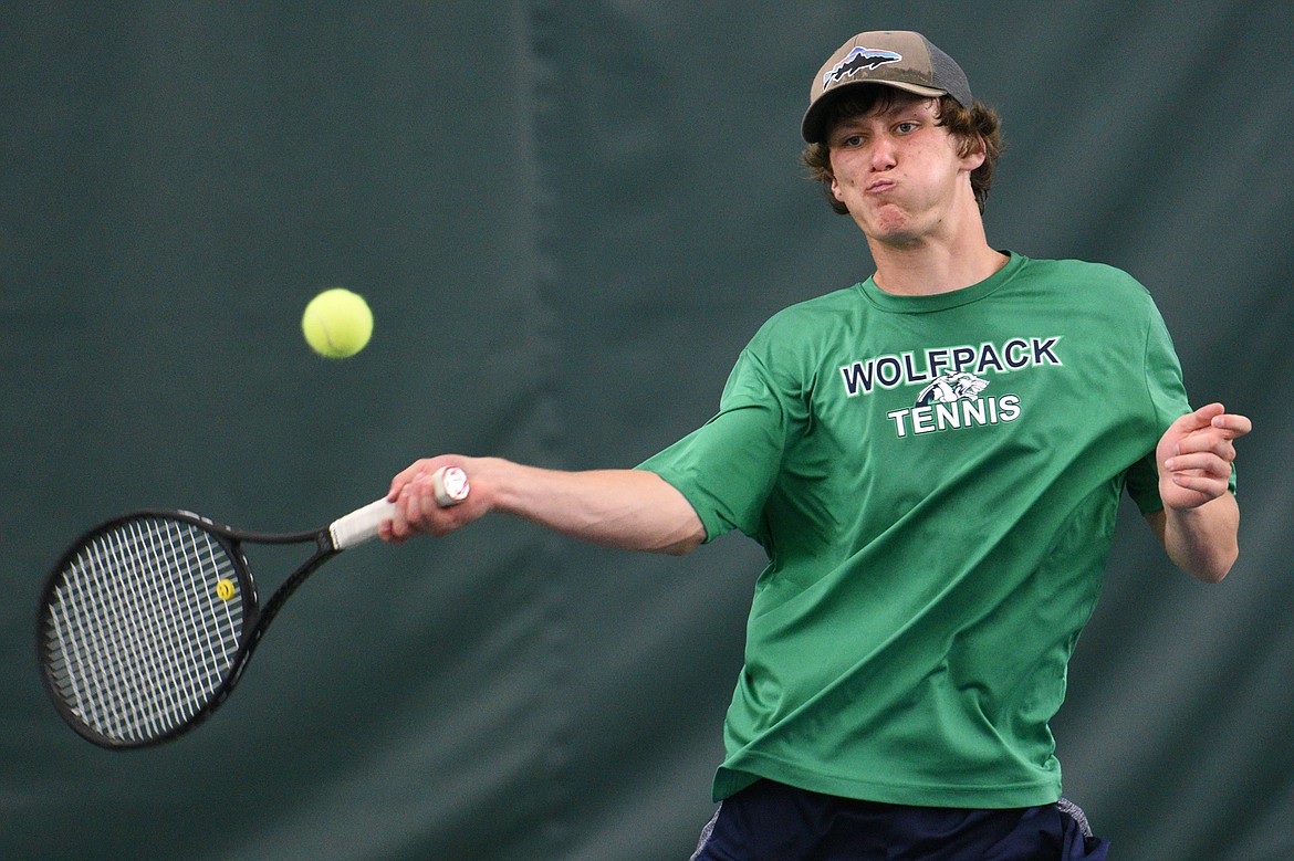 Glacier&#146;s Kyle Buckingham hits a return in a doubles match against Bozeman&#146;s Johnny Kamp and Hudson Hart in the first round of the 2018 AA State Tennis Tournament in Kalispell on Thursday. Buckingham&#146;s doubles partner was Tyler Keller. (Casey Kreider/Daily Inter Lake)