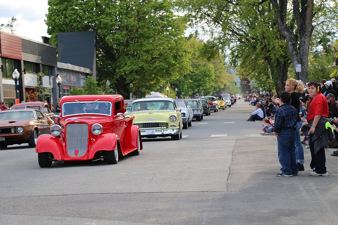 Crowds pack Chruch Street in Sandpoint to watch classic cars go by during a past Lost in the '50s classic car parade.