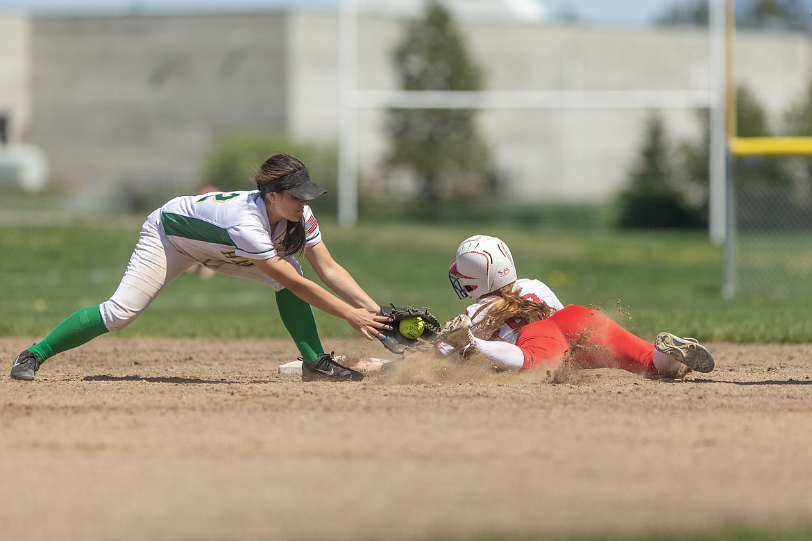 Photo by Jason Duchow Photography
Lakeland shortstop Samantha Byrne tags out Bri Barlow of Sandpoint at second base in the second game Saturday in Rathdrum.