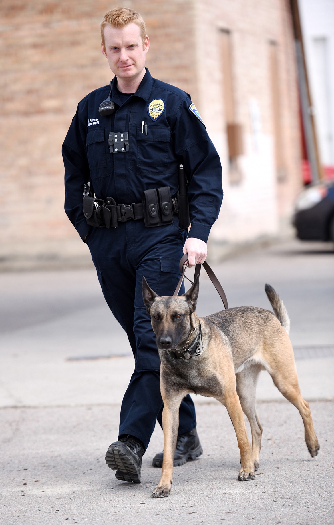 Officer Jason Parce and Cairo at Sweet Peaks in Kalispell.(Brenda Ahearn/Daily Inter Lake)