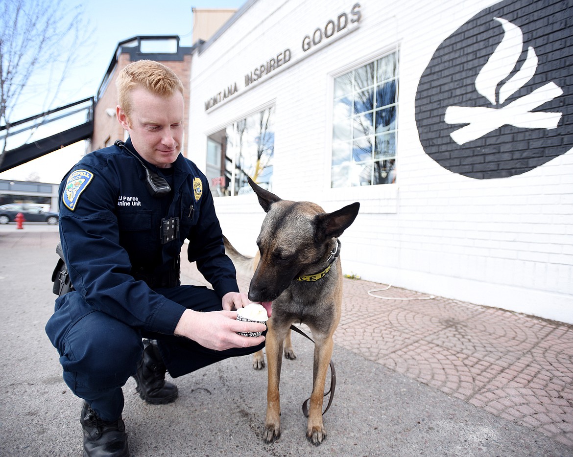 Officer Jason Parce and Cairo at Sweet Peaks in Kalispell.(Brenda Ahearn/Daily Inter Lake)