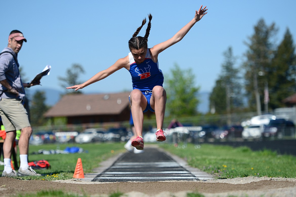 Bigfork's Scout Jessop with a jump of 12'10 1/2&quot; in the long jump at the Bigfork Invitational track and field meet on Saturday. (Casey Kreider/Daily Inter Lake)