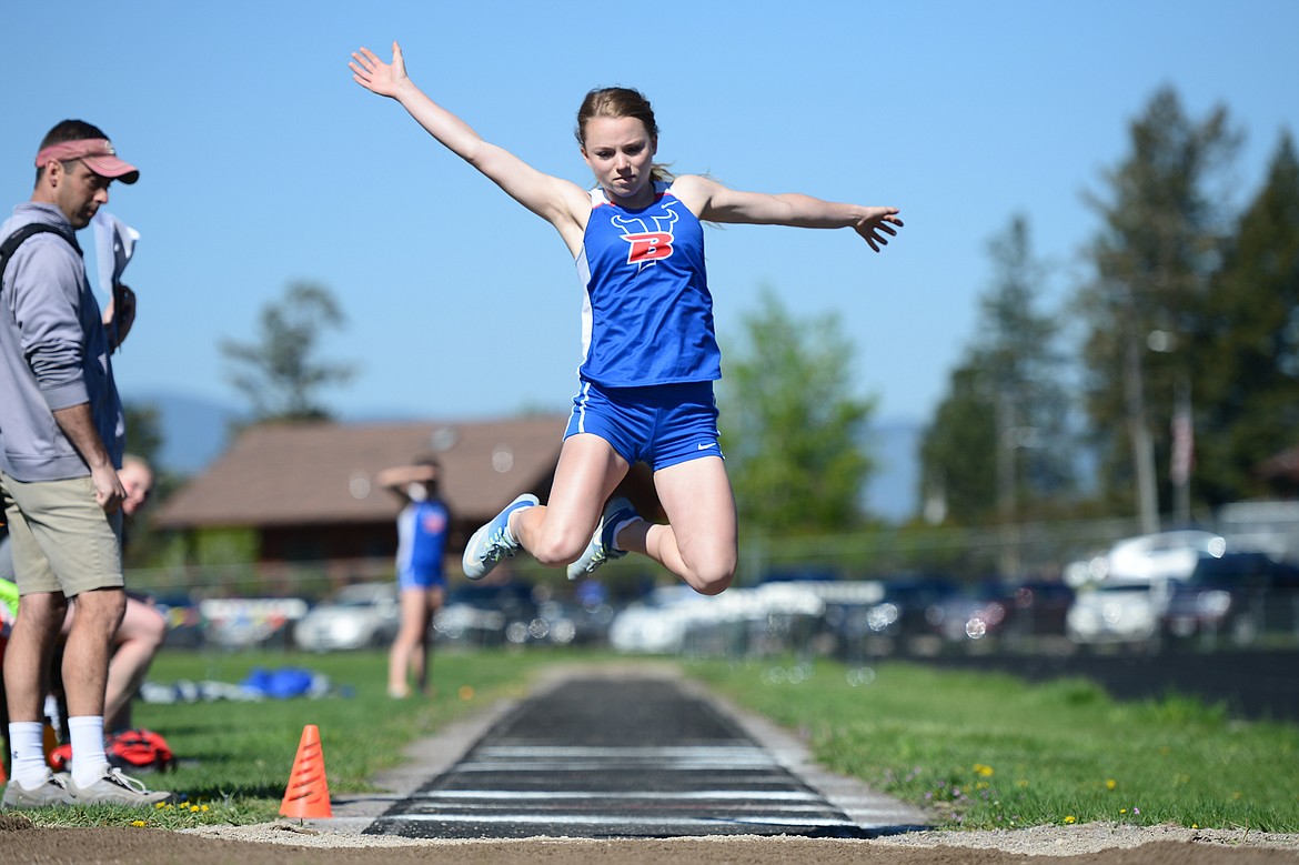 Bigfork's Jaclyn Saunders with a jump of 11'9&quot; in the long jump at the Bigfork Invitational track and field meet on Saturday. (Casey Kreider/Daily Inter Lake)