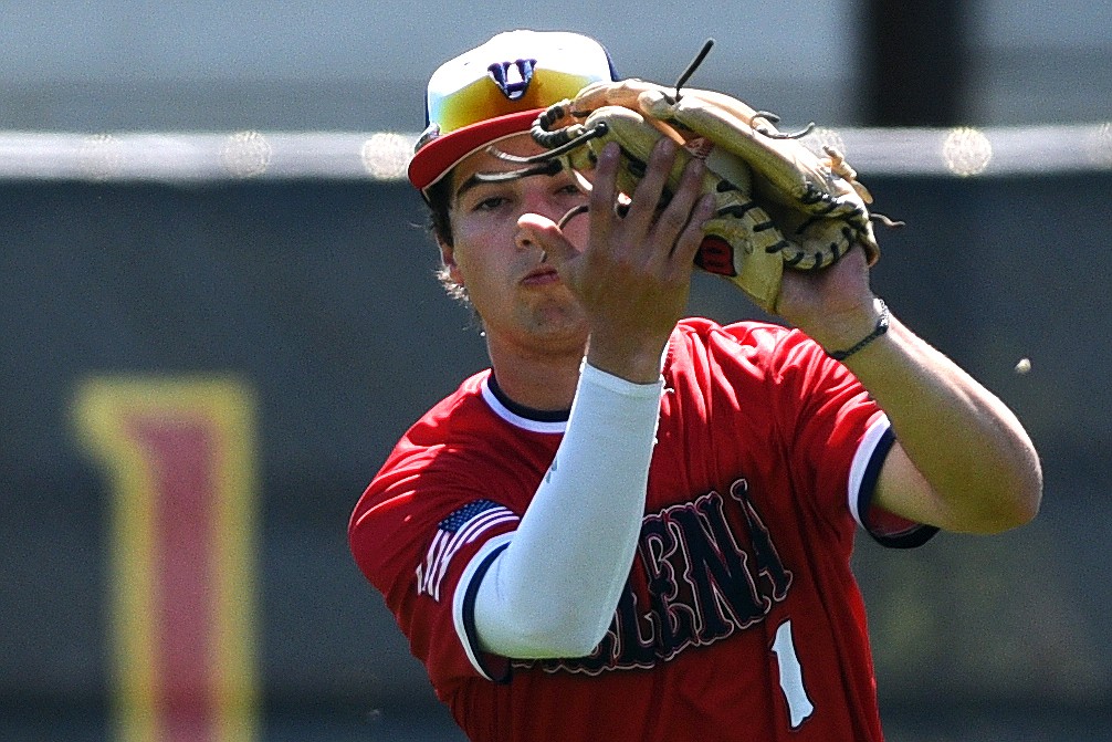 Helena's Matt Krieger squeezes a shallow fly ball for an out against the Kalispell Lakers at Griffin Field on Saturday. (Casey Kreider/Daily Inter Lake)