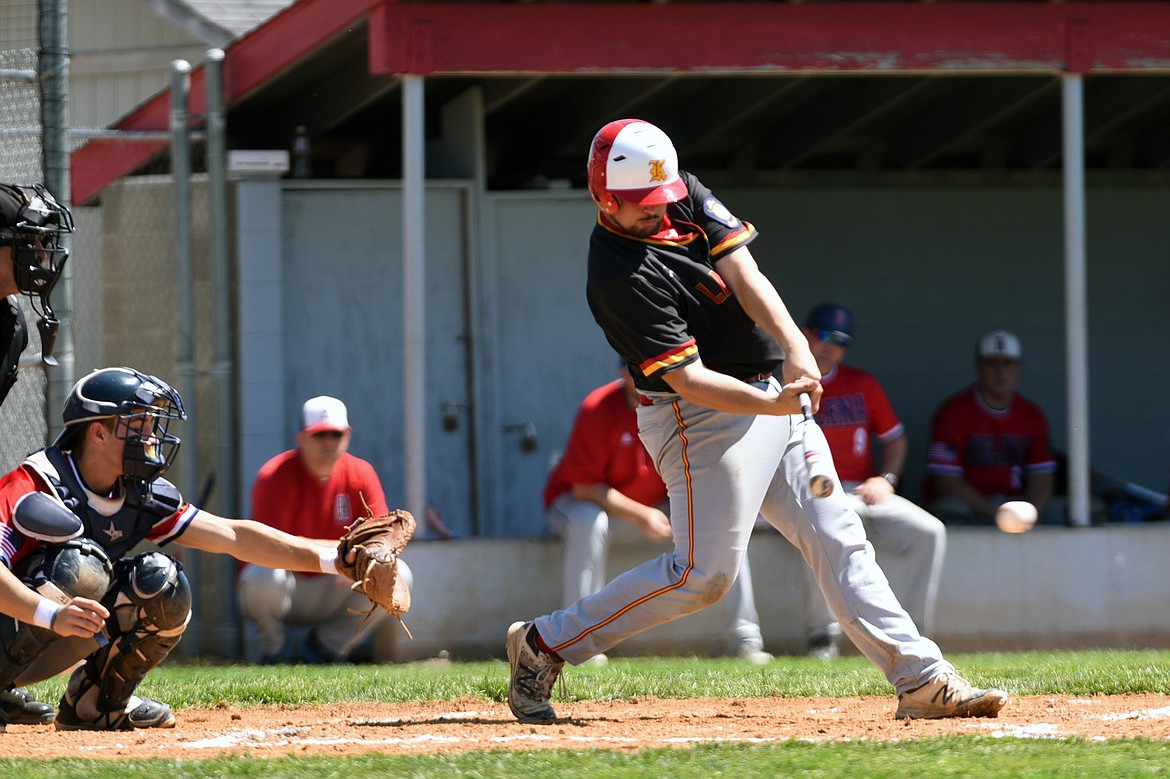 Kalispell's Dawson Smith drives in a run in the bottom of the fifth against Helena on Saturday. (Casey Kreider/Daily Inter Lake)